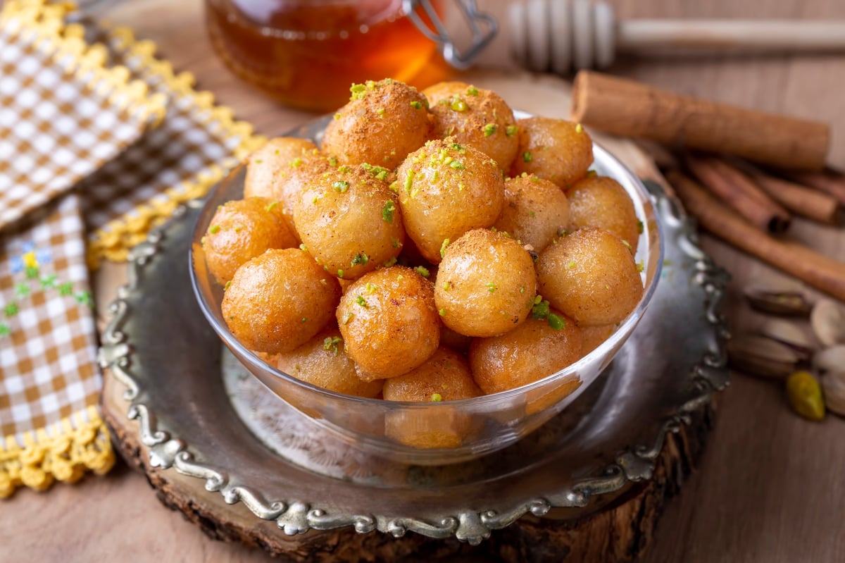 Golden crispy loukoumades doughnuts